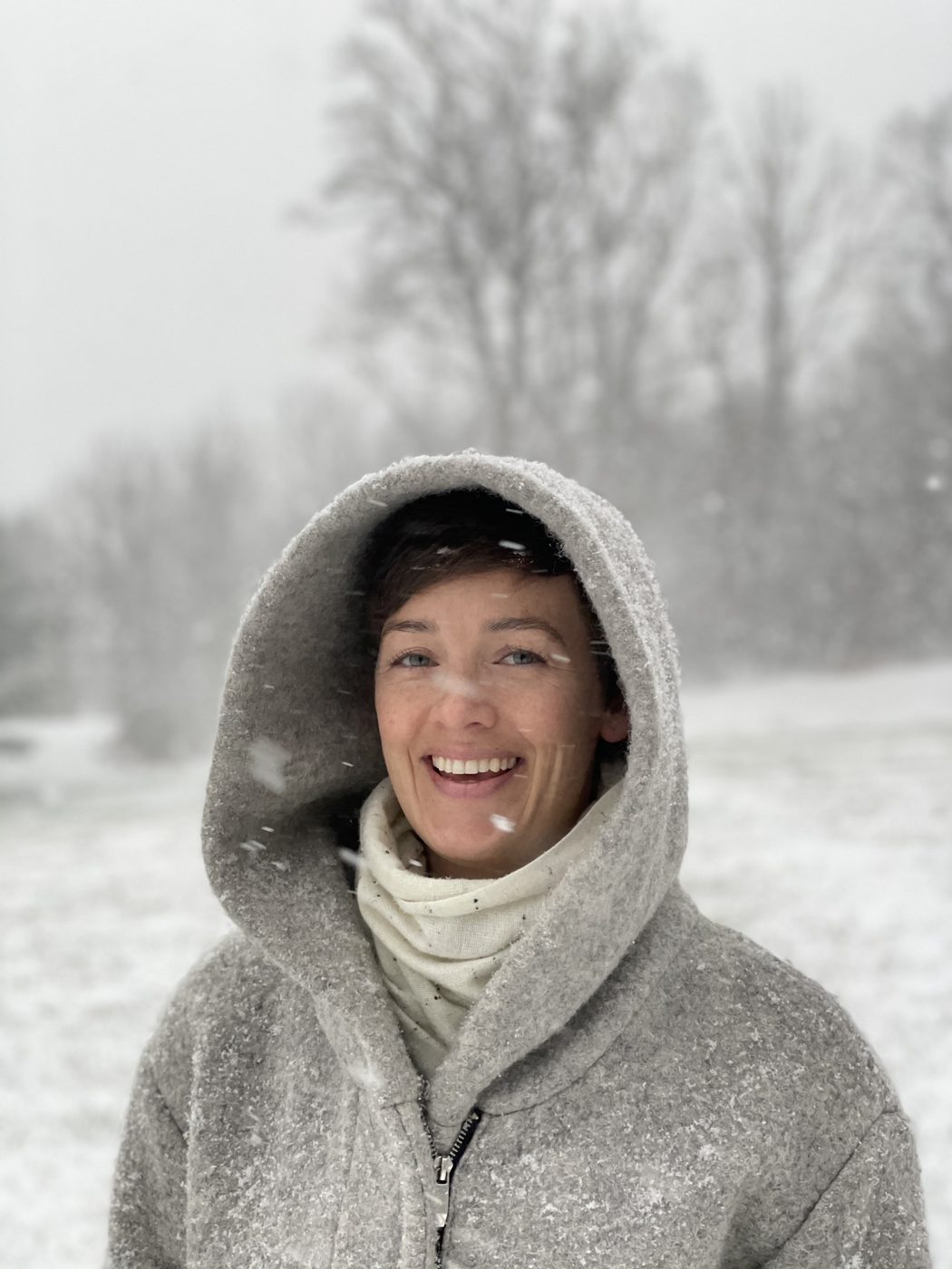 Cassie laughing in a snowstorm
